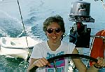 Rachelle at the helm of Spica Star - Jeanneau 525 (John Beck).